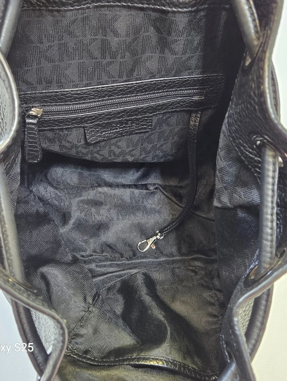 Michael Kors Black Pebbled Leather Drawstring Backpack Quiet Luxury Large